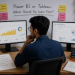 Aspiring data analyst comparing Power BI and Tableau dashboards while deciding which business intelligence tool to learn first.